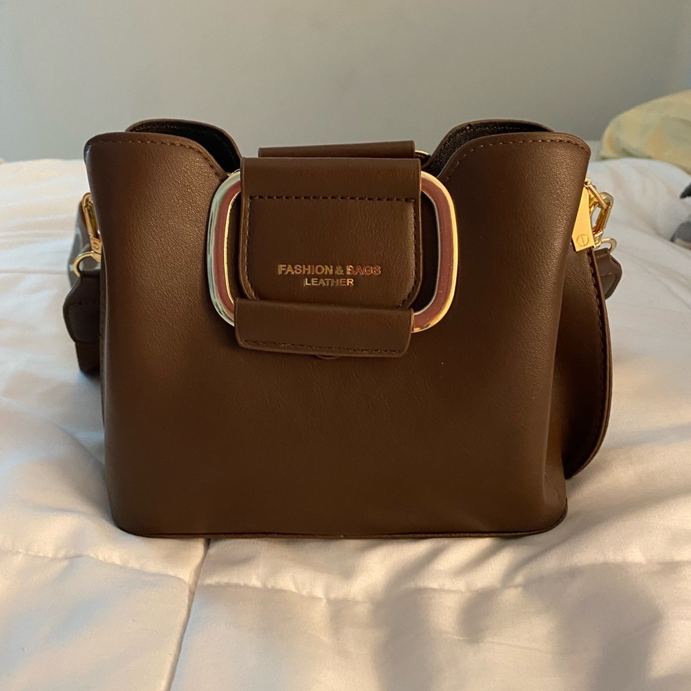 brown & gold leather bag